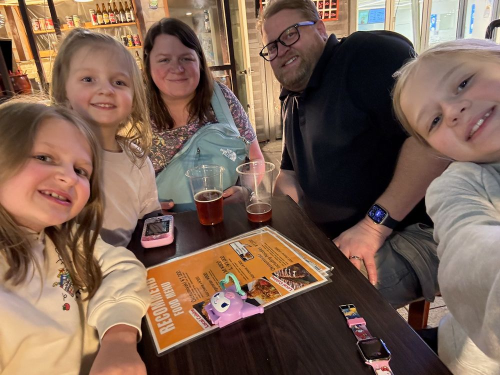 The whole Clarkson family at dinner on Dotonbori in Osaka