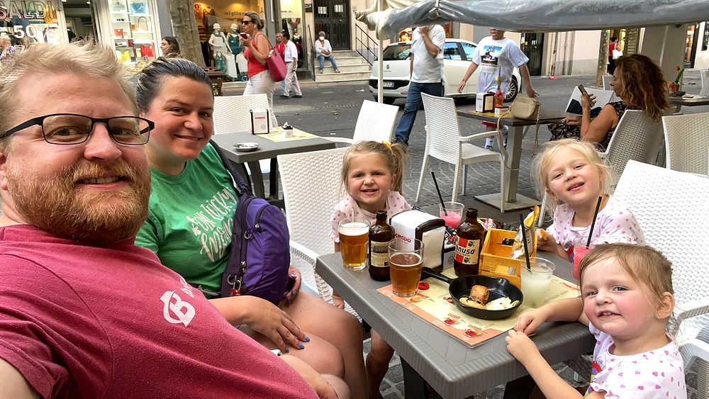 The family together on a street in Naples, Italy